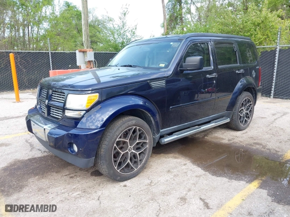 2011 Dodge Nitro Heat with VIN 1D4PU4GX2BW514237, listed as a IAAI auction lot 42109697 with 151,365 mi miles. Bid and sale history available at carsss.com. Image 2.