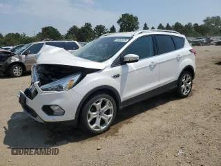 2019 Ford Escape Titanium with VIN 1FMCU9J93KUA51020, listed as a Copart auction lot 60462495 with 59,998 mi miles and Salvage title. Bid and sale history available at DreamBid. Image 1.