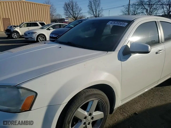 2011 Dodge Avenger Lux with VIN 1B3BD2FB6BN548982, listed as a Copart auction lot 42639585 with 141,826 mi miles and Salvage Title. Bid and sale history available at carsss.com. Image 11.