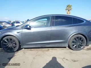 2018 Tesla Model X 75D with VIN 5YJXCBE22JF124270, listed as a IAAI auction lot 41909734 with 92,553 mi miles. Bid and sale history available at carsss.com. Image 14.