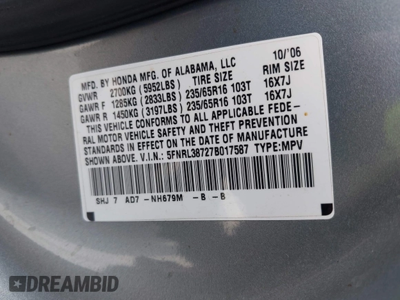 2007 Honda Odyssey EX-L with VIN 5FNRL38727B017587, listed as a IAAI auction lot 41900739 with 216,909 mi miles and . Bid and sale history available at carsss.com. Image 9.
