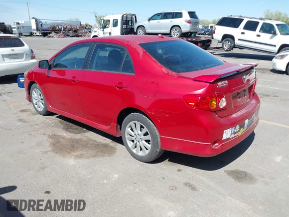 2009 Toyota Corolla with VIN 1NXBU40E09Z098951, listed as a IAAI auction lot 42090512 with 199,787 mi miles. Bid and sale history available at carsss.com. Image 3.