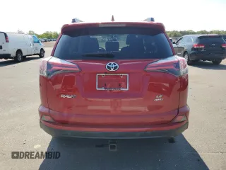 2017 Toyota RAV4 LE z VIN 2T3BFREV4HW583874, wystawiony jako Copart lot #59519115 z przebiegiem 57 287 mil mil oraz Szkoda całkowita • Salvage title. Historia ofert i sprzedaży dostępna na DreamBid. Obrazek 6.