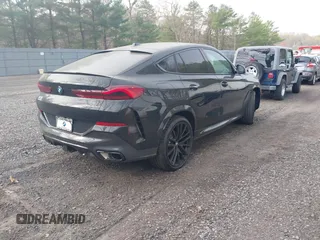 2025 BMW X6 xDrive40i with VIN 5UX33EX09S9Y89594, listed as a IAAI auction lot 42072438 with 460 mi miles and . Bid and sale history available at DreamBid. Image 4.