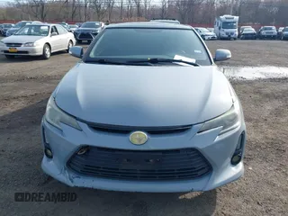 2014 Scion tC z VIN JTKJF5C71E3081033, wystawiony jako IAAI lot #41928949 z przebiegiem 144 112 mil mil oraz . Historia ofert i sprzedaży dostępna na DreamBid. Obrazek 12.