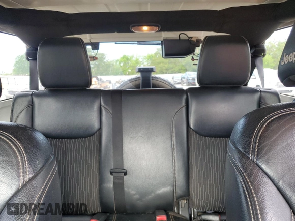 2013 Jeep Wrangler Unlimited Freedom z VIN 1C4BJWDG7DL582764, wystawiony jako Copart lot #54133275 z przebiegiem 183 507 mil mil oraz Szkoda całkowita • Salvage title. Historia ofert i sprzedaży dostępna na DreamBid. Obrazek 10.