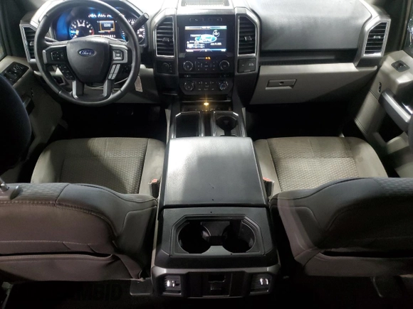 2015 Ford F-150 XLT with VIN 1FTEW1EP4FKD52429, listed as a Copart auction lot 60623615 with 173,605 mi miles and Salvage title. Bid and sale history available at DreamBid. Image 8.