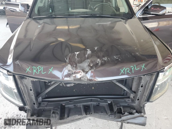 2016 Chevrolet Suburban LS with VIN 1GNSCGKC7GR386459, listed as a Copart auction lot 58208435 with 137,205 mi miles and Salvage title. Bid and sale history available at DreamBid. Image 12.