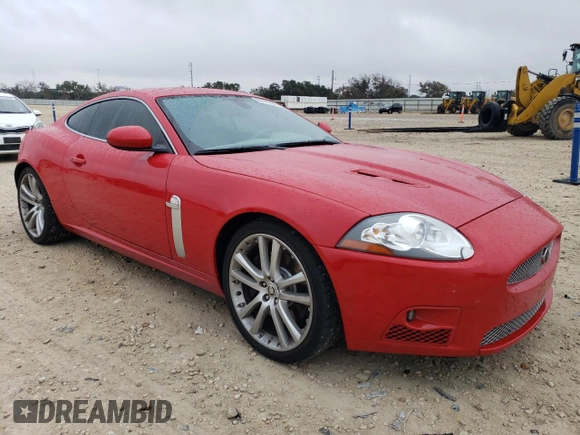 2007 Jaguar XK with VIN SAJWA43C379B19952, listed as a Copart auction lot 85141054 with 49,599 mi miles and Salvage Title. Bid and sale history available at carsss.com. Image 4.