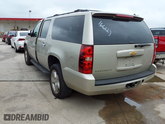 2013 Chevrolet Suburban LT with VIN 1GNSKJE74DR166223, listed as a IAAI auction lot 42172184 with 200,901 mi miles and . Bid and sale history available at DreamBid. Image 3.