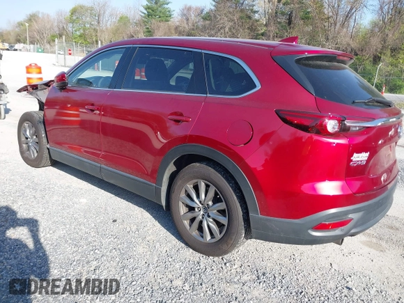 2019 Mazda CX-9 Touring with VIN JM3TCACY0K0310851, listed as a IAAI auction lot 42066395 with 91,046 mi miles and . Bid and sale history available at DreamBid. Image 3.