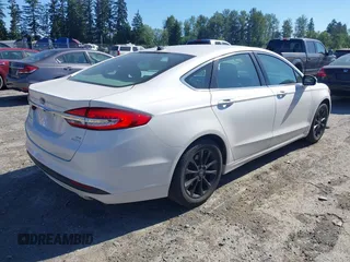 2017 Ford Fusion SE z VIN 3FA6P0HD3HR132779, wystawiony jako IAAI lot #42690212 z przebiegiem 165 293 mil mil oraz . Historia ofert i sprzedaży dostępna na DreamBid. Obrazek 4.