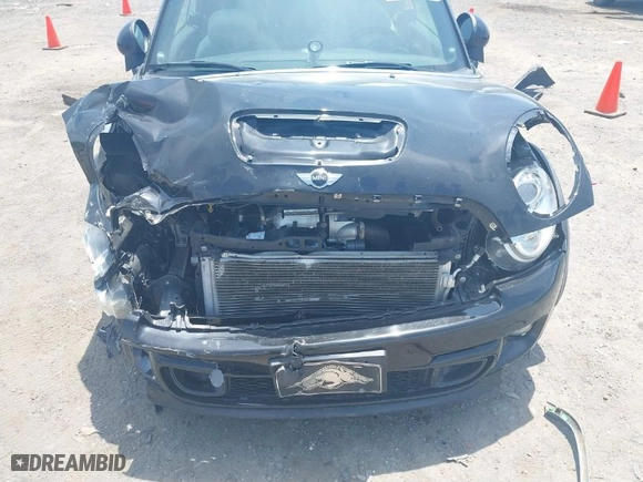 2013 MINI Cooper Convertible S with VIN WMWZP3C59DT550746, listed as a IAAI auction lot 39538986 with 59,934 mi miles. Bid and sale history available at carsss.com. Image 14.