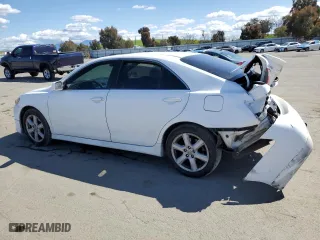 2009 Toyota Camry LE with VIN 4T1BK46K09U588521, listed as a Copart auction lot 51677555 with 241,833 mi miles and Salvage Title. Bid and sale history available at carsss.com. Image 2.