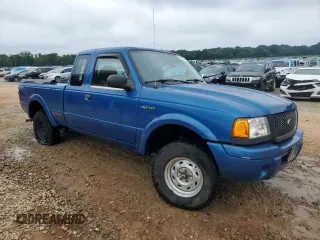 2002 Ford Ranger XL Fleet with VIN 1FTYR44U52PA71654, listed as a Copart auction lot 61395215 with 193,722 mi miles and Salvage title. Bid and sale history available at DreamBid. Image 4.