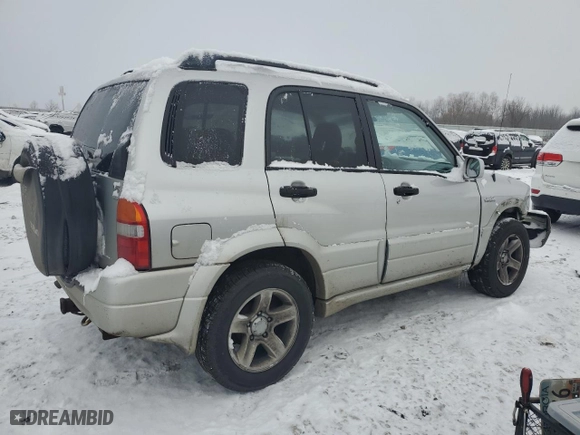 2003 Suzuki Grand Vitara with VIN JS3TD62V634107209, listed as a Copart auction lot 83019744 with 219,180 mi miles and Salvage Title. Bid and sale history available at carsss.com. Image 3.