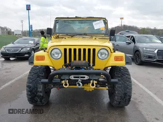 2000 Jeep Wrangler SE with VIN 1J4FA29P5YP705215, listed as a IAAI auction lot 41920532 with 92,927 mi miles and . Bid and sale history available at DreamBid. Image 13.