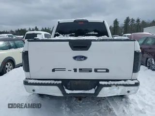2018 Ford F-150 XL with VIN 1FTEW1E58JKD67099, listed as a IAAI auction lot 41526282 with 128,420 mi miles. Bid and sale history available at carsss.com. Image 16.