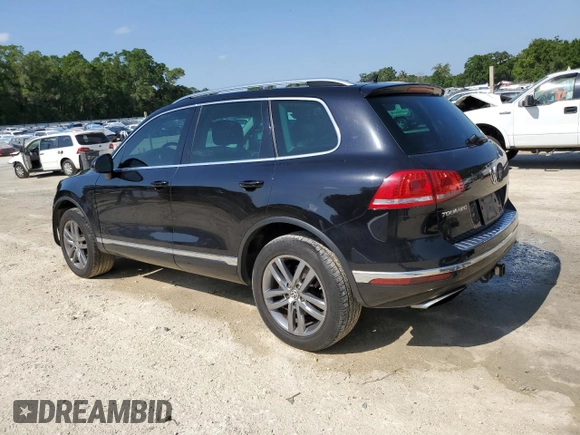 2015 Volkswagen Touareg Lux с VIN WVGEP9BP4FD004212, выставлен на аукционе Copart как лот 54021345 с пробегом 156 164 миль миль и Списание • Salvage title. История ставок и продаж доступна на DreamBid. Изображение 2.