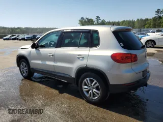 2012 Volkswagen Tiguan SE z VIN WVGAV7AX6CW543053, wystawiony jako Copart lot #53160825 z przebiegiem 167 185 mil mil oraz Szkody całkowita. Historia ofert i sprzedaży dostępna na DreamBid. Obrazek 2.
