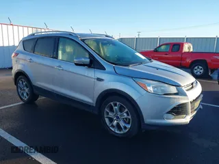 2014 Ford Escape Titanium with VIN 1FMCU9J94EUD01966, listed as a IAAI auction lot 41226043 with 132,730 mi miles. Bid and sale history available at carsss.com. Image 1.