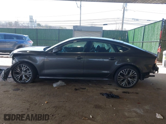 2016 Audi A7 3.0 Prestige with VIN WAU2GAFC5GN197012, listed as a IAAI auction lot 41908607 with 86,084 mi miles. Bid and sale history available at carsss.com. Image 14.