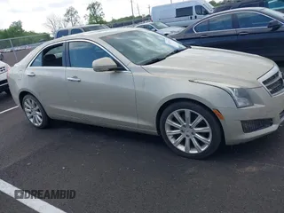 2014 Cadillac ATS Luxury AWD with VIN 1G6AH5RX6E0155382, listed as a IAAI auction lot 42025727 with 104,862 mi miles and . Bid and sale history available at carsss.com. Image 13.