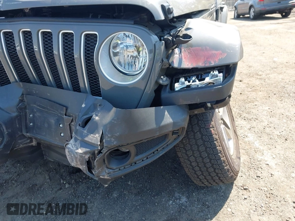 2022 Jeep Wrangler Unlimited Sahara with VIN 1C4HJXEM7NW206585, listed as a IAAI auction lot 42102516 with 10,769 mi miles and . Bid and sale history available at DreamBid. Image 22.
