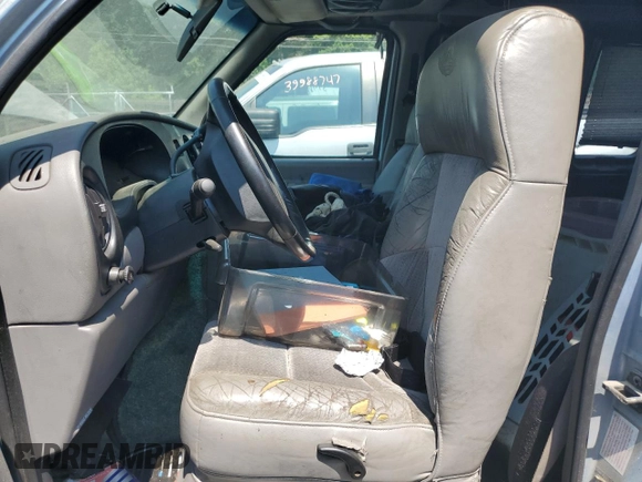 2000 Ford Econoline Cargo Recreational with VIN 1FDRE14L5YHA56690, listed as a Copart auction lot 58926155 with 162,797 mi miles and Salvage title. Bid and sale history available at DreamBid. Image 7.