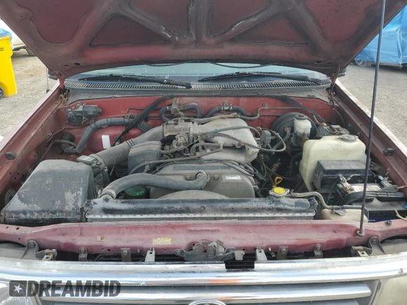 1996 Toyota T100 DX with VIN JT4TN12D0T0021827, listed as a Copart auction lot 44328465 with 253,582 mi miles and Salvage Title. Bid and sale history available at carsss.com. Image 12.