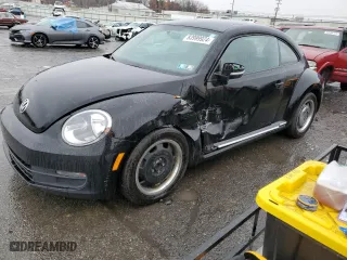 2012 Volkswagen Beetle 2.5L w/Sun/Sound/Nav PZEV with VIN 3VWJP7AT3CM642390, listed as a Copart auction lot 83999924 with 103,884 mi miles and Salvage Title. Bid and sale history available at carsss.com. Image 1.