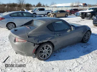 2024 Mazda MX-5 Miata Grand Touring z VIN JM1NDAM73R0607806, wystawiony jako Copart lot #88531435 z przebiegiem 3 089 mil mil oraz Szkoda całkowita • Salvage title. Historia ofert i sprzedaży dostępna na DreamBid. Obrazek 3.