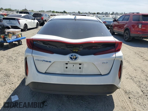 2021 Toyota Prius LE with VIN JTDKAMFP6M3184835, listed as a Copart auction lot 54198095 with 88,055 mi miles and Salvage Title. Bid and sale history available at DreamBid. Image 6.