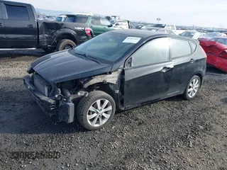 2012 Hyundai Accent SE with VIN KMHCU5AEXCU053645, listed as a IAAI auction lot 41407582 with 118,290 mi miles. Bid and sale history available at carsss.com. Image 2.