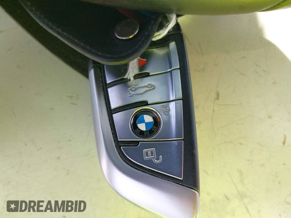 2018 BMW 5 Series 530i with VIN WBAJA5C56JG897692, listed as a IAAI auction lot 41813052 with 37,610 mi miles and . Bid and sale history available at DreamBid. Image 11.