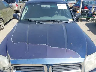 2006 Dodge Dakota SLT with VIN 1D7HW48NX6S708140, listed as a IAAI auction lot 42054527 with 226,944 mi miles. Bid and sale history available at carsss.com. Image 10.