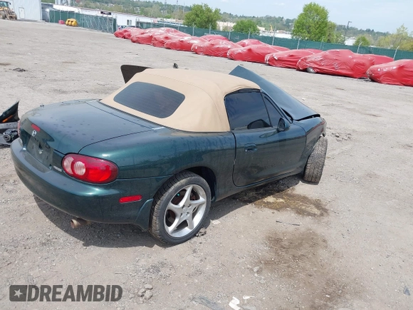 2001 Mazda MX-5 Miata with VIN JM1NB353810212361, listed as a IAAI auction lot 42128732 with 115,860 mi miles and . Bid and sale history available at DreamBid. Image 4.