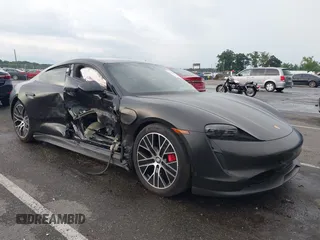 2021 Porsche Taycan 4S z VIN WP0AB2Y13MSA43638, wystawiony jako IAAI lot #42638298 z przebiegiem 27 634 mil mil oraz . Historia ofert i sprzedaży dostępna na DreamBid. Obrazek 6.