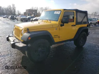 2015 Jeep Wrangler Willys Wheeler with VIN 1C4AJWAG8FL680401, listed as a Copart auction lot 82557944 with 188,806 mi miles and Salvage title. Bid and sale history available at DreamBid. Image 1.
