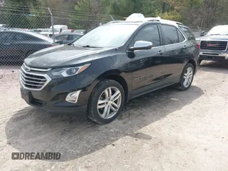 2019 Chevrolet Equinox Premier z VIN 2GNAXYEX5K6143922, wystawiony jako IAAI lot #42134219 z przebiegiem 105 496 mil mil oraz . Historia ofert i sprzedaży dostępna na DreamBid. Obrazek 21.