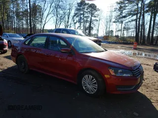 2015 Volkswagen Passat 1.8T Limited Edition with VIN 1VWAT7A33FC007414, listed as a IAAI auction lot 41305891 with 81,440 mi miles. Bid and sale history available at carsss.com. Image 1.