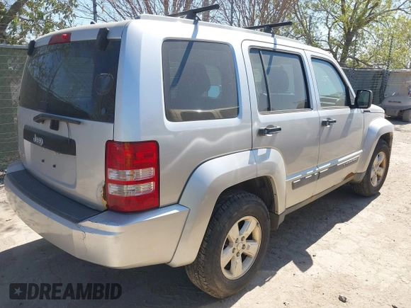 2012 Jeep Liberty Sport with VIN 1C4PJMAK1CW106039, listed as a IAAI auction lot 41810966 with 120,121 mi miles. Bid and sale history available at carsss.com. Image 4.