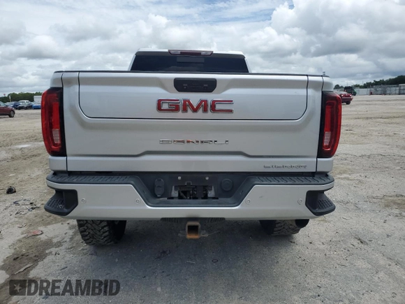 2020 GMC Sierra 2500HD Denali z VIN 1GT49REY7LF319360, wystawiony jako Copart lot #59770565 z przebiegiem 69 509 mil mil oraz Nie do naprawy • Non repairable. Historia ofert i sprzedaży dostępna na DreamBid. Obrazek 6.