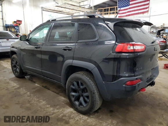 2015 Jeep Cherokee Trailhawk z VIN 1C4PJMBS0FW598694, wystawiony jako Copart lot #60731615 z przebiegiem 130 219 mil mil oraz Czysty tytuł • Clean title. Historia ofert i sprzedaży dostępna na DreamBid. Obrazek 2.