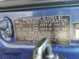 2003 Kia Sedona LX with VIN KNDUP131736448714, listed as a Copart auction lot 82308764 with 91,073 mi miles and Salvage Title. Bid and sale history available at carsss.com. Image 15.
