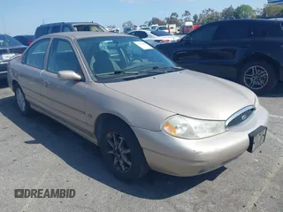 1999 Ford Contour z VIN 3FAFP66L6XM102099, wystawiony jako IAAI lot #42161889 z przebiegiem 100 340 mil mil oraz . Historia ofert i sprzedaży dostępna na DreamBid. Obrazek 1.