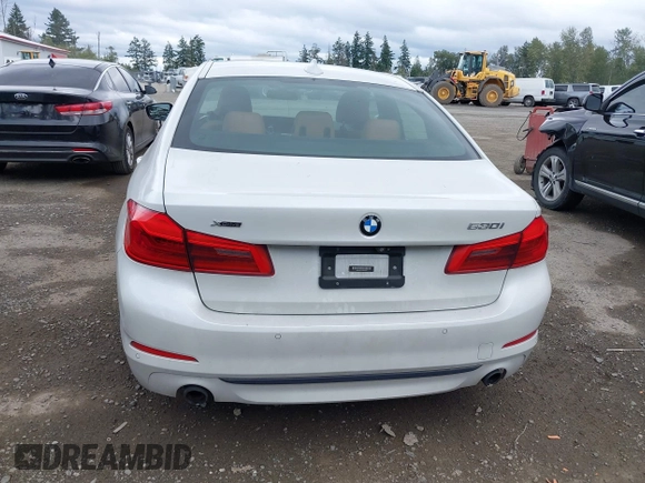 2018 BMW 5 Series 530i xDrive with VIN WBAJA7C5XJWA72470, listed as a IAAI auction lot 42526656 with 66,979 mi miles and . Bid and sale history available at DreamBid. Image 16.