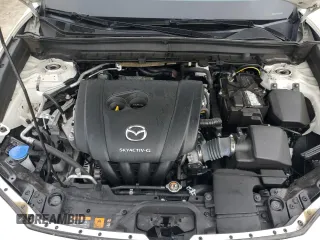 2021 Mazda CX-30 S with VIN 3MVDMBAL4MM219507, listed as a Copart auction lot 55579865 with 53,707 mi miles and Salvage title. Bid and sale history available at DreamBid. Image 12.