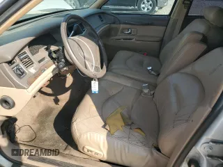 1997 Lincoln Town Car Signature z VIN 1LNLM82W9VY681894, wystawiony jako Copart lot #71467034 z przebiegiem 129 142 mil mil oraz Szkody całkowita. Historia ofert i sprzedaży dostępna na DreamBid. Obrazek 7.