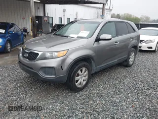 2012 Kia Sorento LX with VIN 5XYKT3A19CG244821, listed as a IAAI auction lot 41862626 with 243,165 mi miles. Bid and sale history available at carsss.com. Image 2.